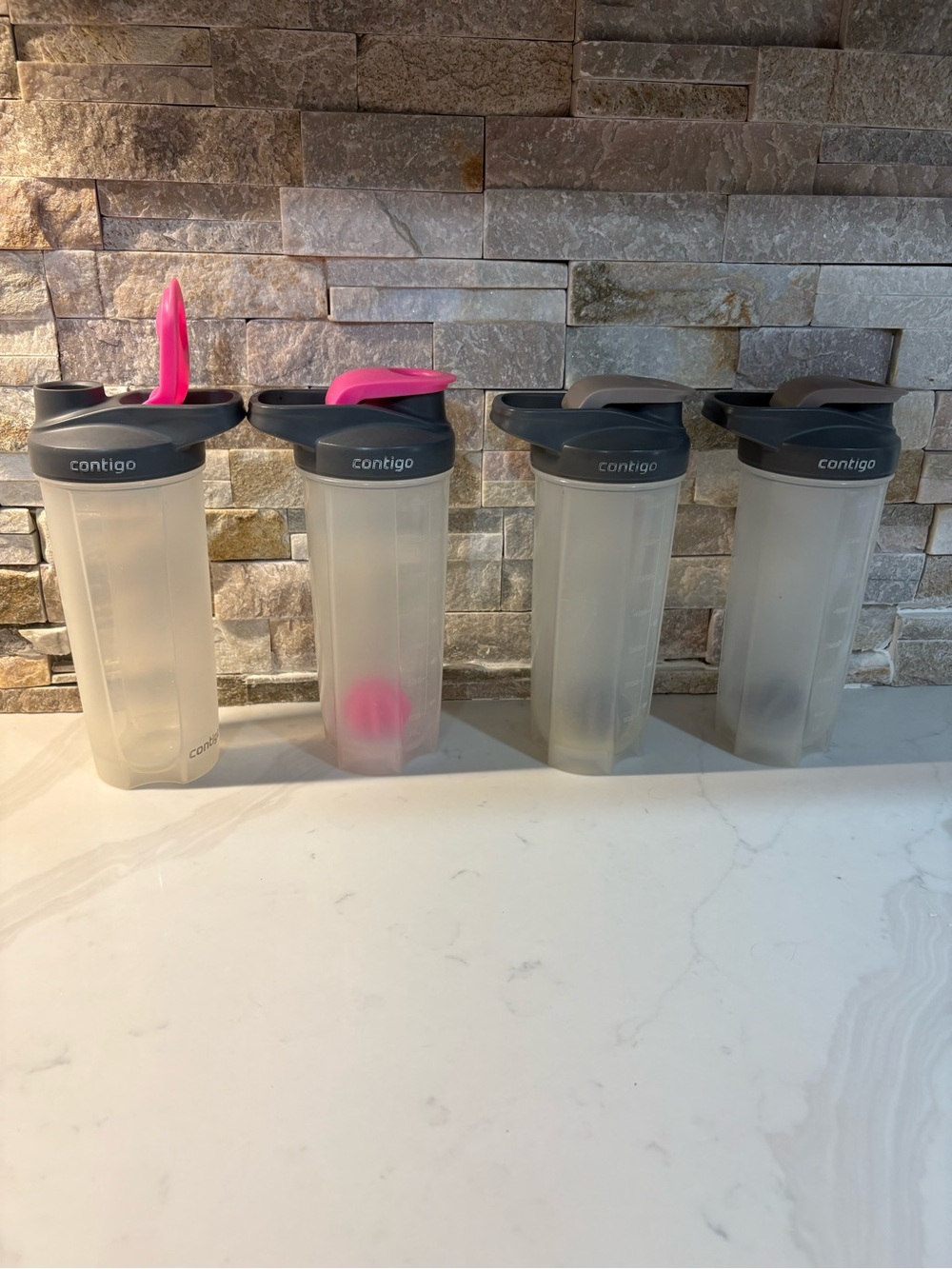 Contigo Clear Shaker Bottles with Gray Lids and Pink Mixing Balls